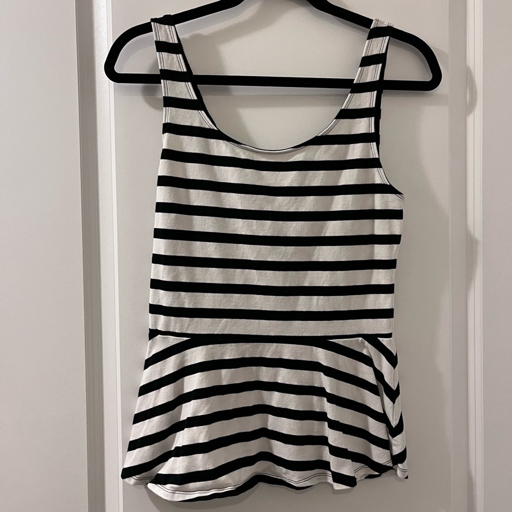 Express peplum top . Size medium . Black and white stripe
